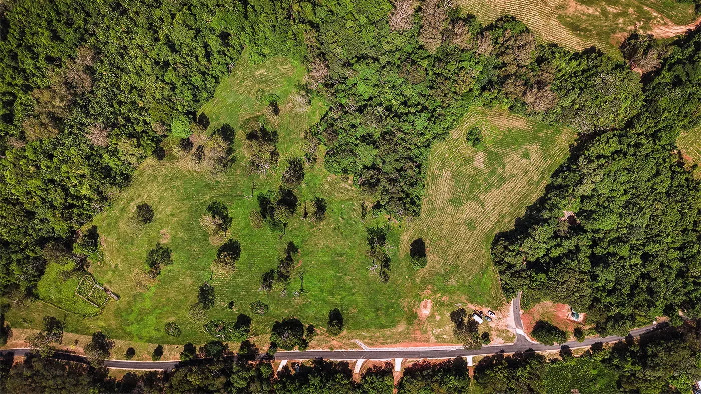 Lot 23 from directly above, the surveyed boundary drawn over the clean plan aerial